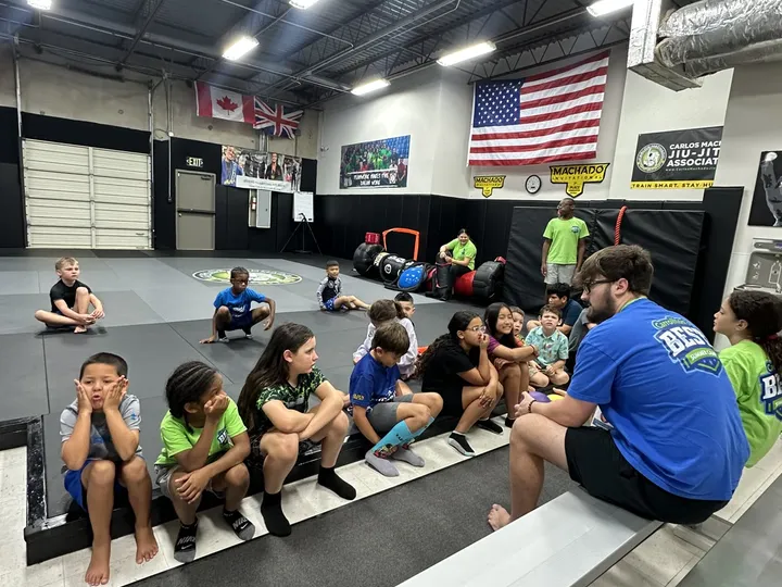 Campers seated together at the academy