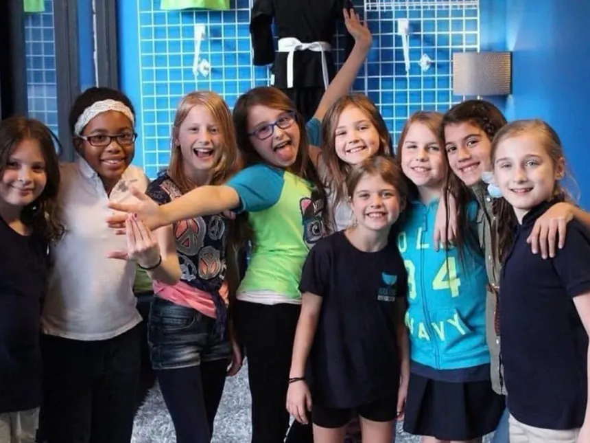A group of campers laughing together at Carrollton's BEST